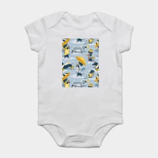 Ready For a Rainy Walk // pattern // pastel blue background dachshunds dogs with yellow and transparent rain coats Baby Bodysuit